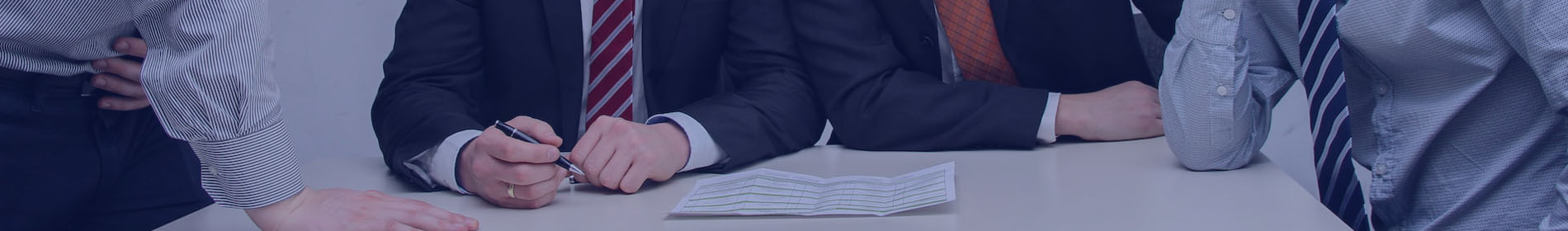 Business professionals completing digital documents